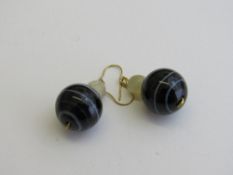 Pair of banded agate & mother of pearl earrings. Estimate £30-40.