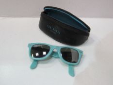 Original lady's Ray Ban 'Wayfarer' sunglasses with code, Ted Baker case. Estimate £30-40.