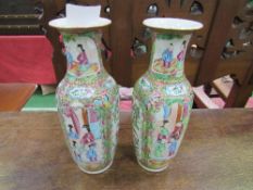 Pair of Famille rose vases, height 25.5cms. Estimate 80-100.