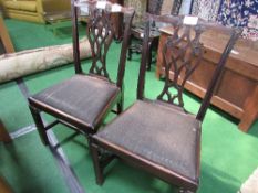 4 Chippendale-style dining chairs with drop-in seats. Estimate £40-50.