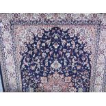 Blue ground Keshan carpet, 3m x 2m. Estimate £60-70.