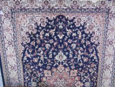 Blue ground Keshan carpet, 3m x 2m. Estimate £60-70.