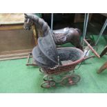 Reproduction Victorian child's pram together with a small rocking horse. Estimate £20-30