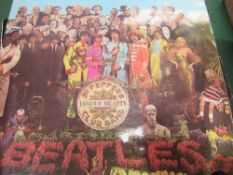 Vintage LP's: The Beatles: Abbey Road; Rubber Soul; Sgt. Peppers Lonely Hearts Club Band. The