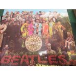 Vintage LP's: The Beatles: Abbey Road; Rubber Soul; Sgt. Peppers Lonely Hearts Club Band. The