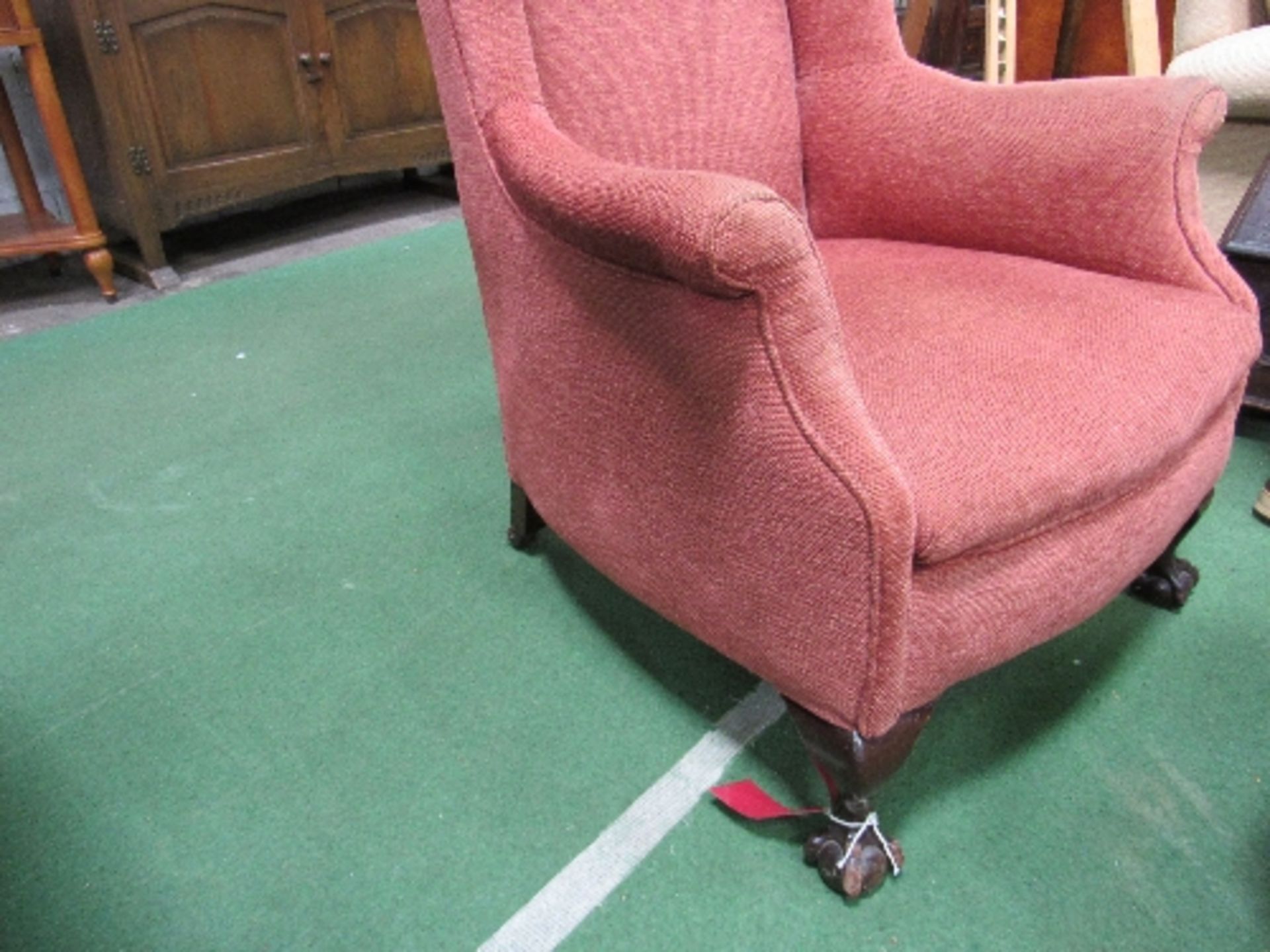 Red upholstered wing back chair on ball & claw feet to front. Estimate £30-50 - Image 2 of 3