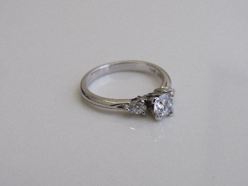 14ct white gold solitaire ring with diamonds to shoulders, size L 1/2, weight 2.7gms. Estimate £