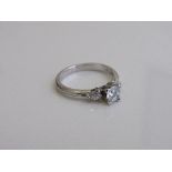 14ct white gold solitaire ring with diamonds to shoulders, size L 1/2, weight 2.7gms. Estimate £