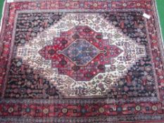 Persian deep red ground rug, 150cms x 115cms. Estimate £20-40
