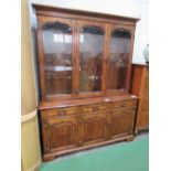 Cherry wood sideboard with glazed book shelves above, by Simpson of Norwich, 150cms x 48cms x