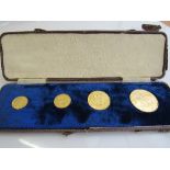 A case containing a set of 4 Queen Victoria Golden Jubilee Sovereigns, 1887: half sovereign;