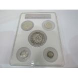 Stabbed Chinese dragon coin set. Estimate £25-35