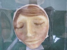 French anatomical wax death mask of a fair haired young girl. Estimate £90-120