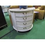 Cream coloured demi-lune 4 drawer cabinet, 84cms (maximum) x 43cms x 78cms. Estimate £30-50.