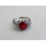 Sterling silver ring with synthetic ruby stone, size P 1/2. Estimate £15-25