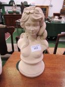 Reconstituted stone bust of a young lady, height 42cms. Estimate £30-40