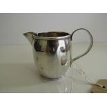 Hallmarked silver milk jug, London 1924 (a few small dents), weight 3.2oz. Estimate £25-35.