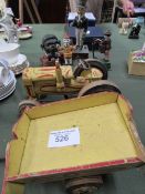 4 cast iron novelty money boxes, wooden model tractor & a farm cart. Estimate £30-50