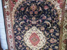 Blue ground Keshan rug. Estimate £60-80