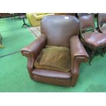 Brown faux leather armchair. Estimate £20-40