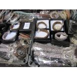 3 trays containing new costume jewellery, mainly bracelets, some boxed. Estimate £60-80