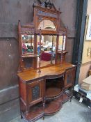 Mahogany Edwardian display cabinet with carved panels & mirrored back, 127cms x 43cms x 228cms.