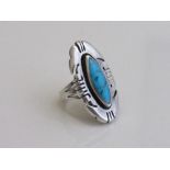 American silver blue stone fashion ring. Estimate £20-40