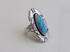 American silver blue stone fashion ring. Estimate £20-40