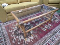 Bamboo framed coffee table with glass top & shelf beneath, 105cms x 51cms x 46cms. Estimate £20-30