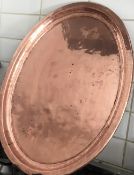 Large hand hammered copper serving tray, 61cms x 46cms. Estimate £20-30