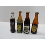 Miniature Coca Cola bottle & 3 miniature Guinness bottles. Estimate £20-30