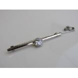 Solitaire diamond, approx 1.97 ct., on 18ct white gold brooch, length 5.8cms, total weight 4.8gms,