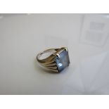 18ct gold ring set with a large aquamarine stone, size of stone 1.3mm x 1.2mm (missing 1 claw), size