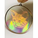 Rare example of 1980's hologram pendant, mounted in gold bezel, in good condition. Estimate £80-100