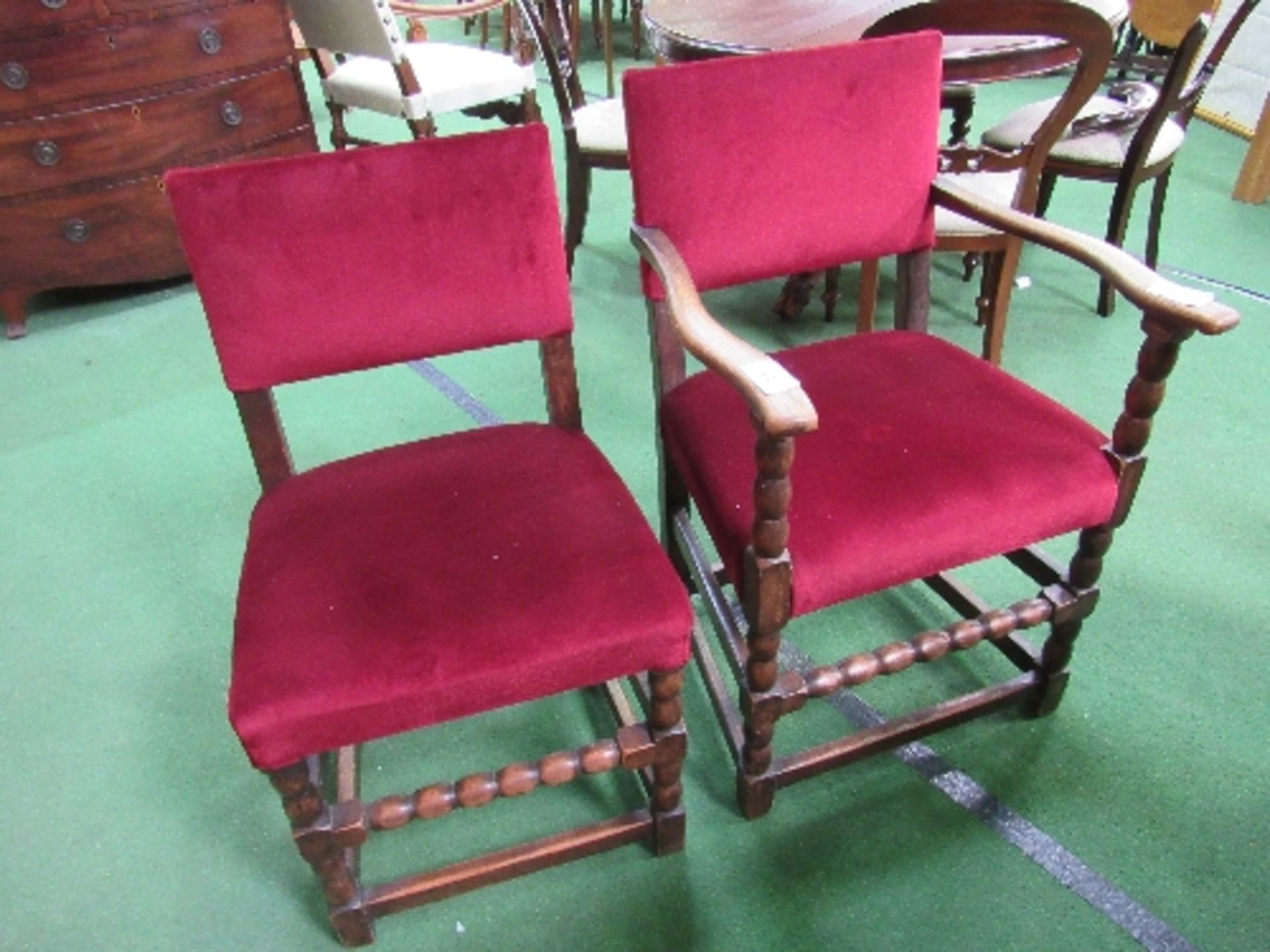 4+2 oak framed red upholstered chairs with bobbin turned stretcher to fronts. Estimate £40-60