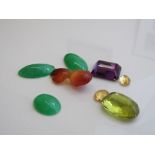 Large oval shaped citrine stone, 2.4cms x 1.5cms x 1.3cms; large amethyst 2cms x 1.6cms x 9cms; 2