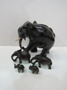 5 various sized ebony elephants, height 14.5cms & small 3cms. Estimate £20-30