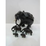 5 various sized ebony elephants, height 14.5cms & small 3cms. Estimate £20-30