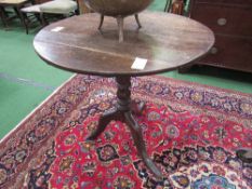 Georgian oak tilt-top circular table, a/f, 79cms diameter, 75cms height. Estimate £30-40