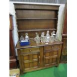 Oak Ercol-style dresser with 2 frieze drawers & cupboard under, 120cms x 46cms x 177cms. Estimate £