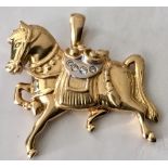 18ct gold horse pendant set with diamond & an articulated bail, 7gms. Estimate £250-300