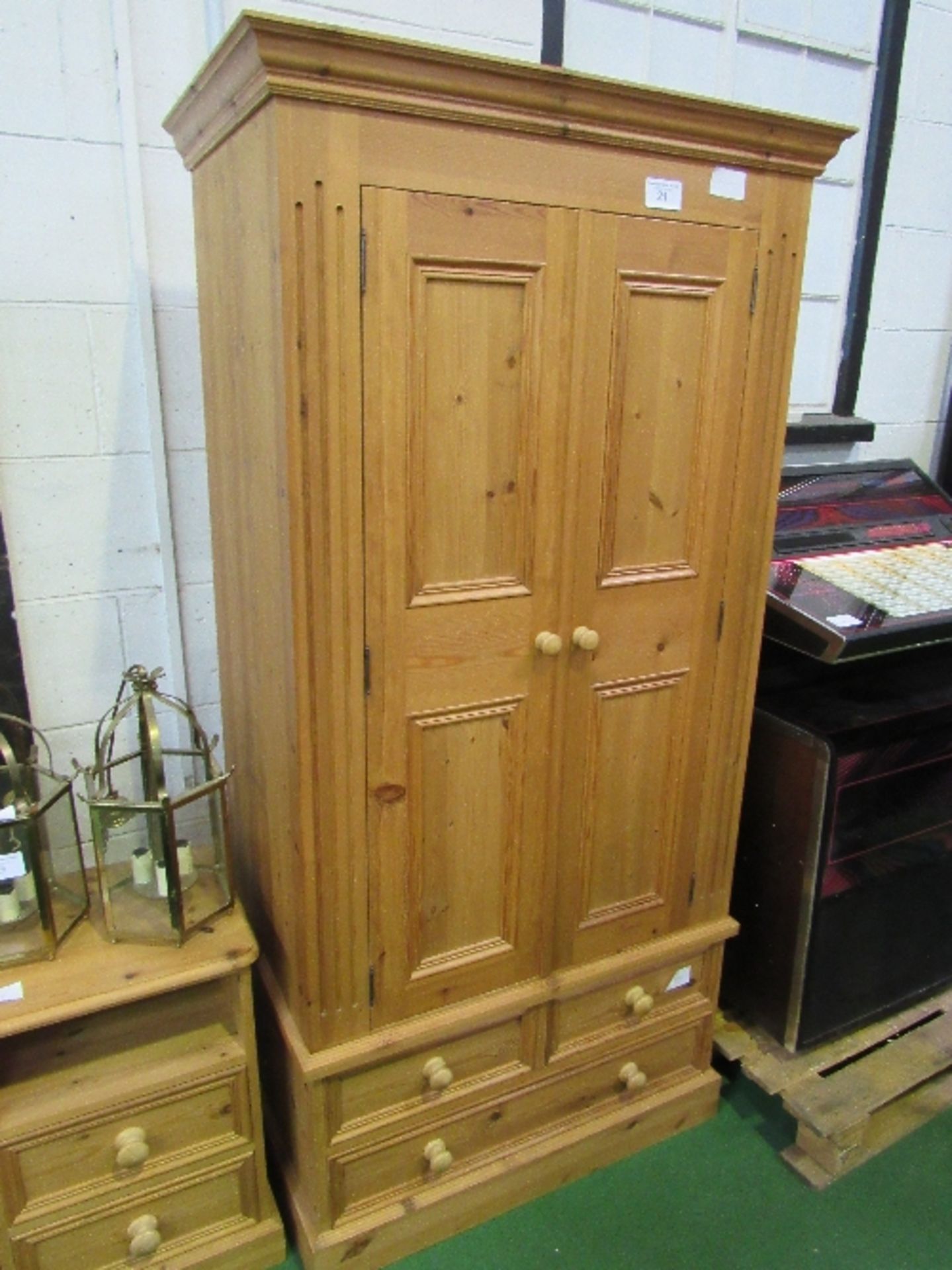 Pine wardrobe with 2 over 1 drawers to base, 85cms x 52cms x 188cms. Estimate £40-60
