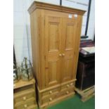 Pine wardrobe with 2 over 1 drawers to base, 85cms x 52cms x 188cms. Estimate £40-60