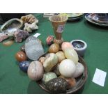 16 polished stone 'eggs' in a dish & 5 decorative eggs & other items. Estimate £50-60