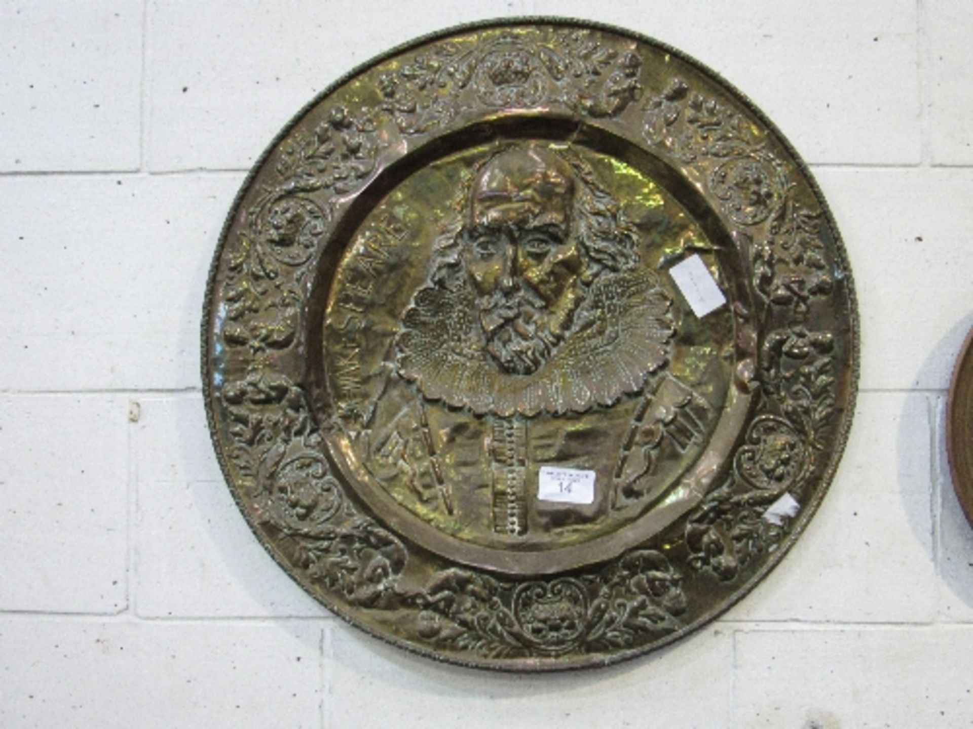 Large brass circular plaque of Shakespeare, diameter 76cms & an Indian brass tray, diameter 49cms.