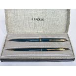 Gold plated Parker 45 duo in original box with gold plated nib. Estimate £20-30