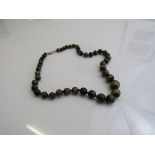 Green tiger's eye necklace with a 14ct gold clasp, length 40cms. Estimate £50-80
