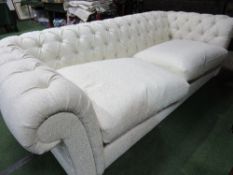 John Lewis cream upholstered Chesterfield (as new), length 220cms, width 102cms. Estimate £100-150