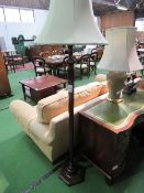 Mahogany hexagonal tapered lamp standard c/w shade together with an oak lamp standard. Estimate £