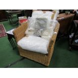 Cane armchair c/w cushions & covers. Estimate £30-40